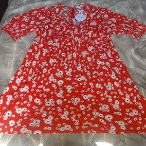 RIXO floral puff sleeve swing dress.